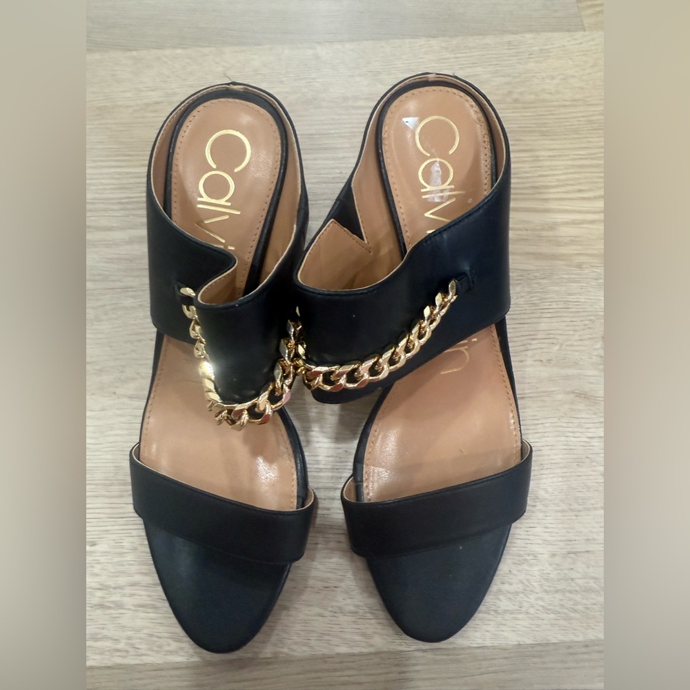 Calvin Klein Black Mules with Gold Chain Accent